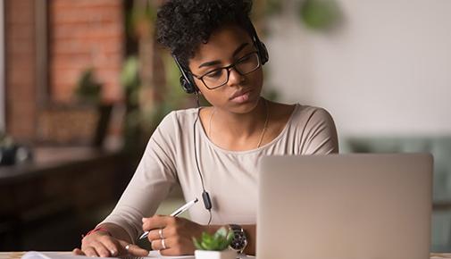 Student looking at laptop